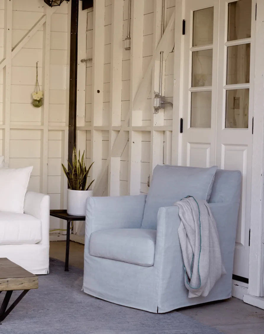East Cay 25in Slipcovered Swivel Glider