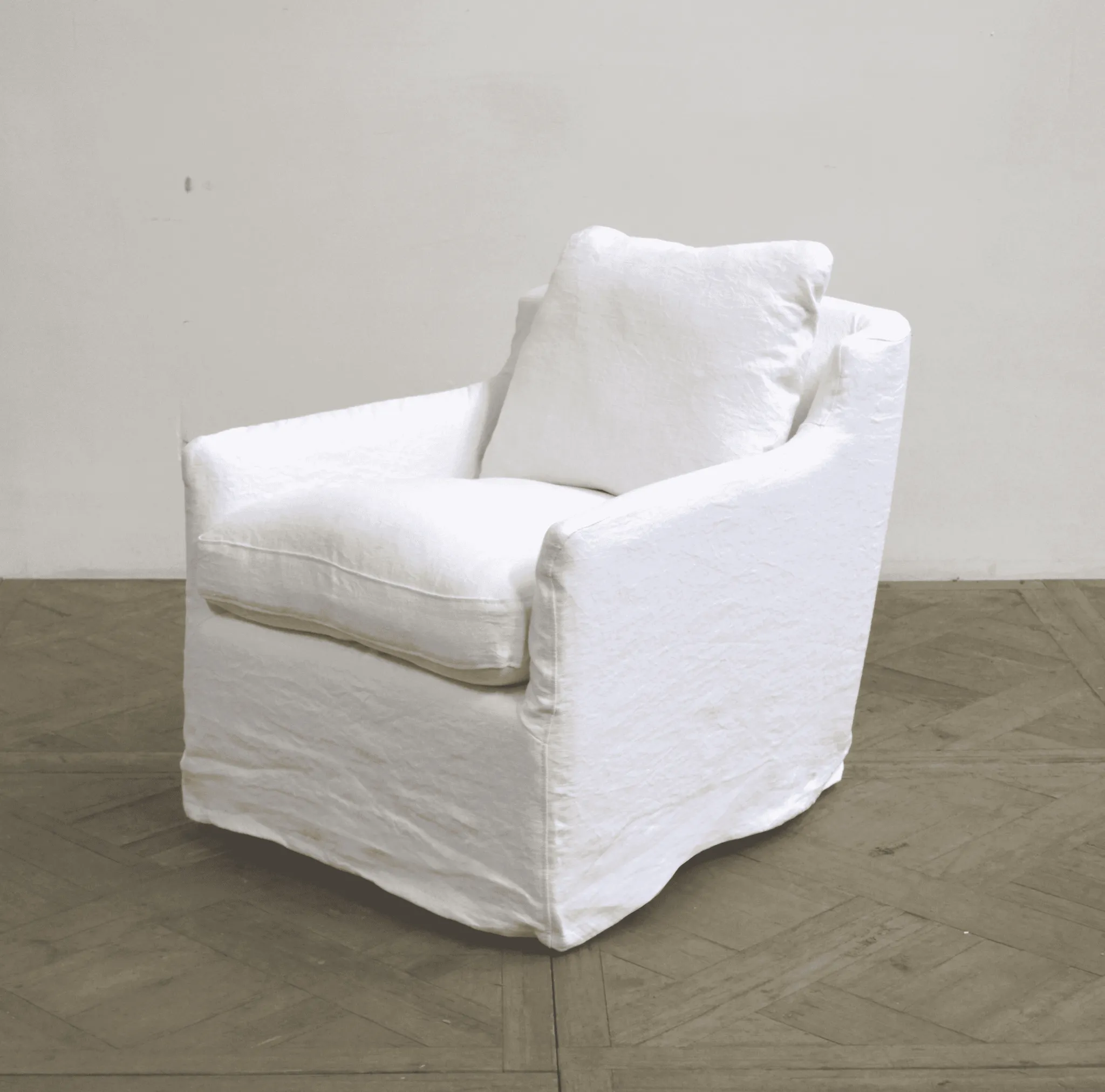 Skipper Belgium White Linen Swivel Slipcovered Chair